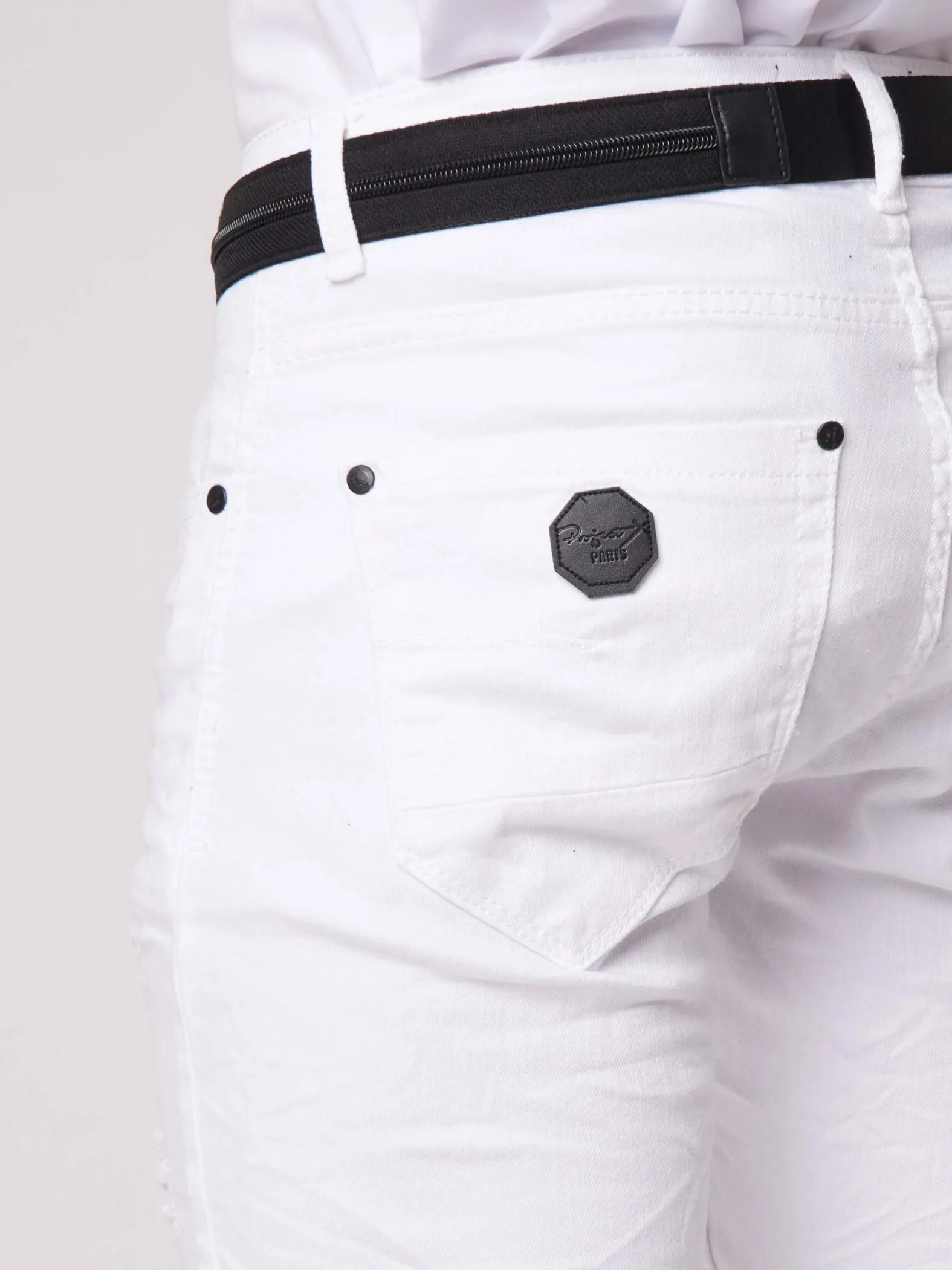 Jeans pitillo con efecto desgastado y agujeros